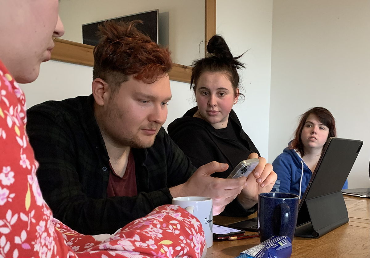 doing people looking at screens